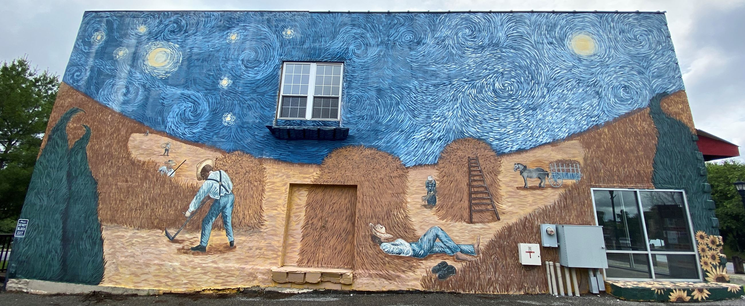 Mural of men working in a field